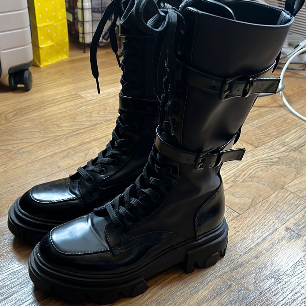 Nine West mixed media combat boots.